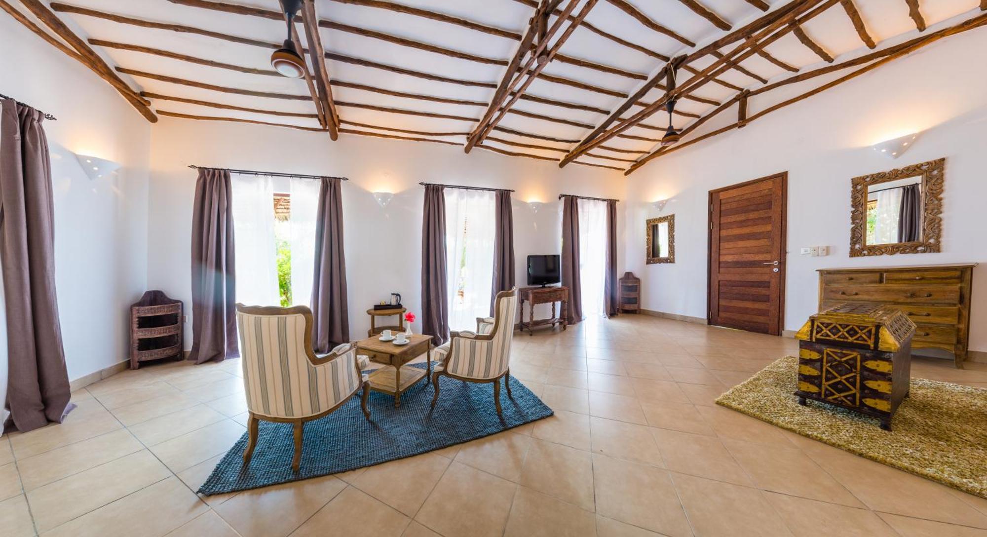 Konokono Beach Resort And Isaraya Luxury Overwater Villas Michamvi Habitación foto